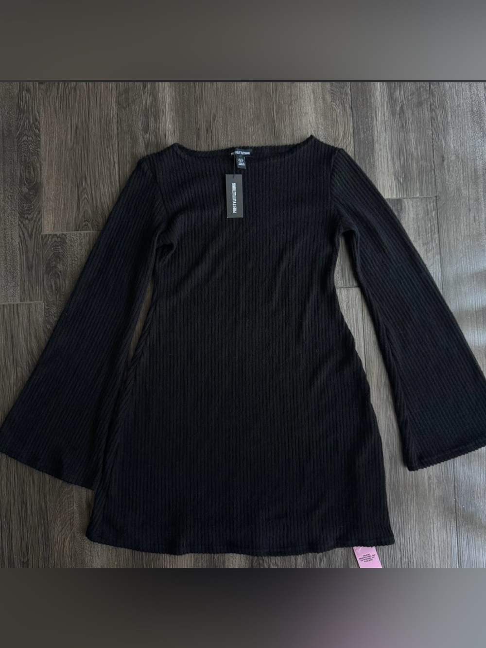 PrettyLittleThing Black Ribbed Long Sleeve Mini Dress with Flared Sleeves
